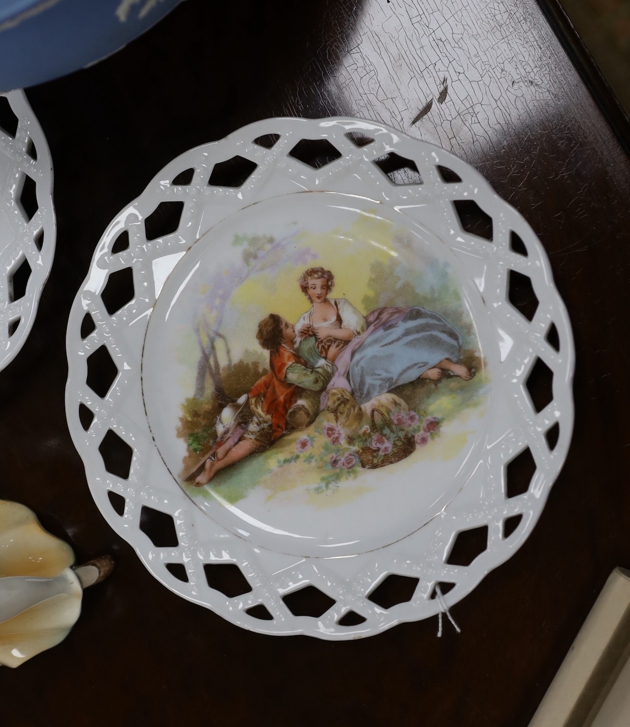 An Art Deco Katzhutte a female dancer, a Wedgwood fruit bowl and a pair of basketweave dishes, tallest 23cm